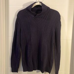 Tasso Elba turtleneck sweater.